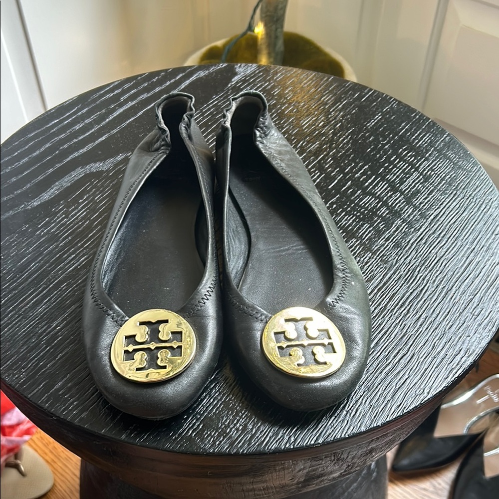 Tory Burch Black Flats with Gold Emblem
